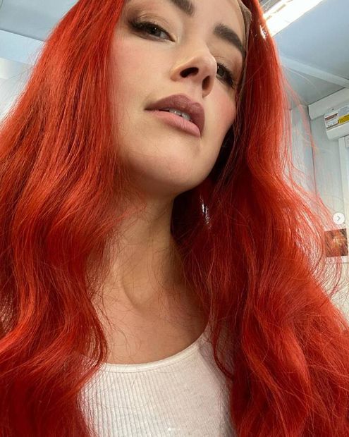 Amber Heard presume cabellera roja, como la que usa en la cinta "Aquaman 2".