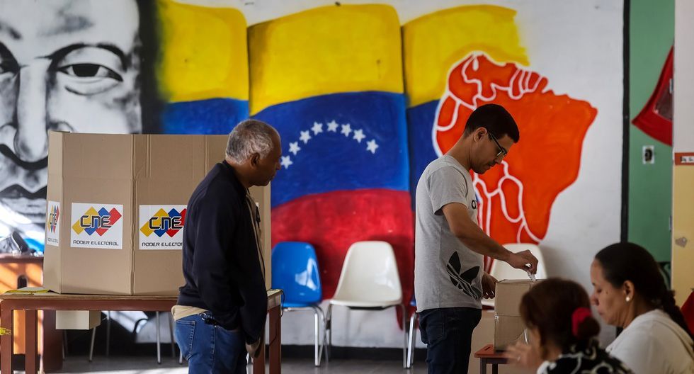 Venezuelans cast their votes in a referendum on Guyana