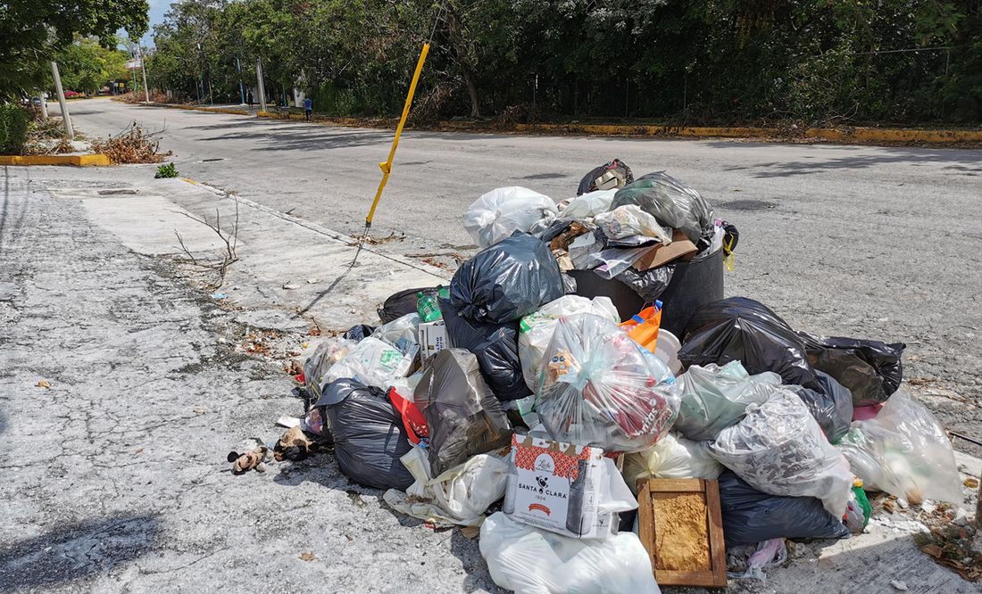 Deficiencias en recolección genera montones de basura en calles de Cancún