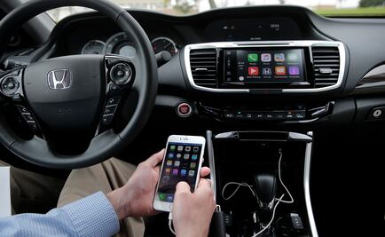 Apple y Google integrarán funciones de móviles a autos
