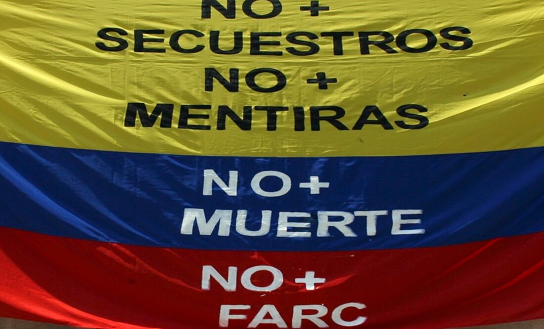 A Colombian flag reads "No more kidnappings, no more lies, no more deaths, no more FARC" - Photo: Ivan Alvarado/REUTERS