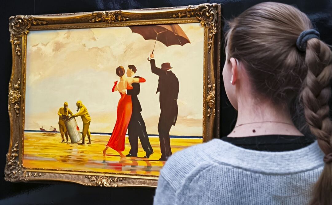 Un cuadro pintado a mano por el artista callejero Banksy. Foto: EFE.