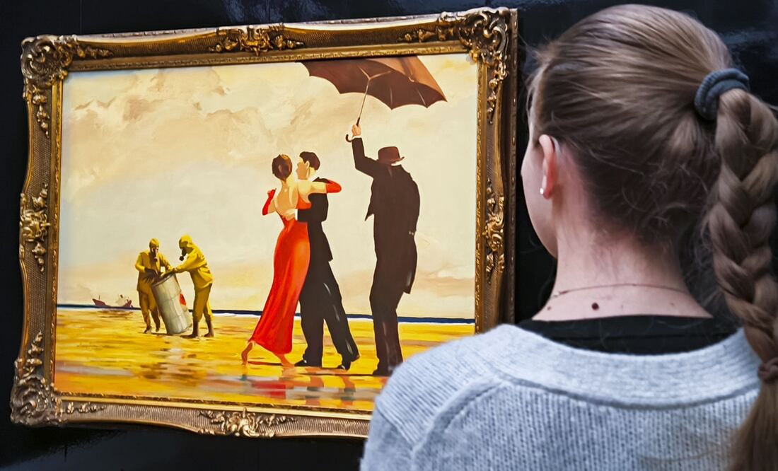 Un cuadro pintado a mano por el artista callejero Banksy. Foto: EFE.