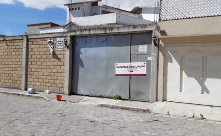 Localizan restos humanos enterrados en el patio de una casa en Metepec