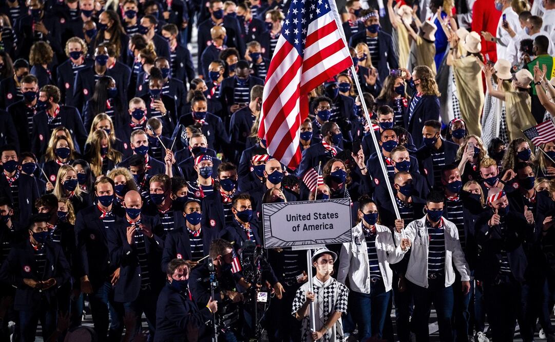 Durante el desfile de las delegaciones, elementos del manga estuvieron presentes en los carteles que anunciaban a los países. Foto: EFE/EPA/LAURENT GILLIERON
