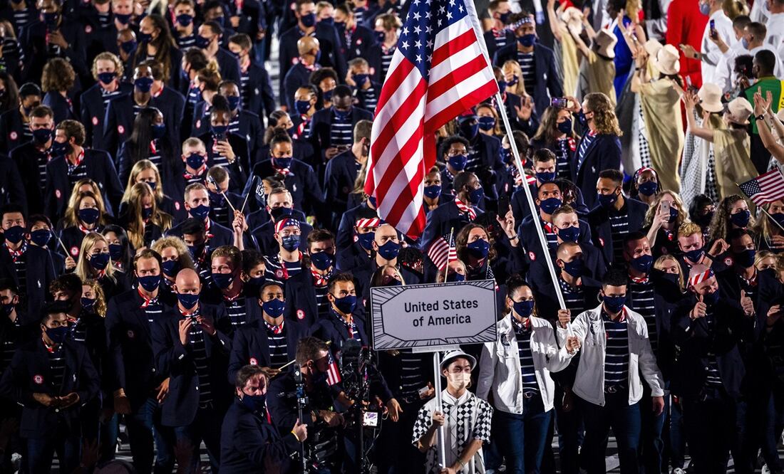 Durante el desfile de las delegaciones, elementos del manga estuvieron presentes en los carteles que anunciaban a los países. Foto: EFE/EPA/LAURENT GILLIERON