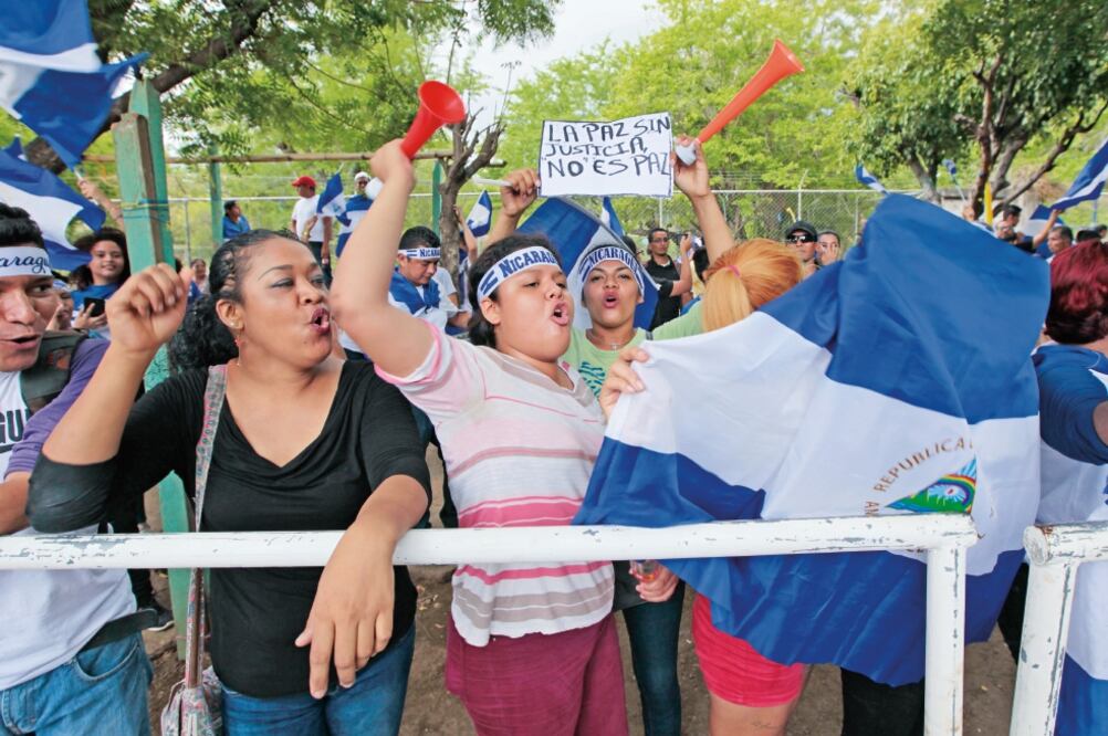 Opositores al gobierno de Daniel Ortega se manifestaron ayer en Managua (DIANA ULLOA. AFP)