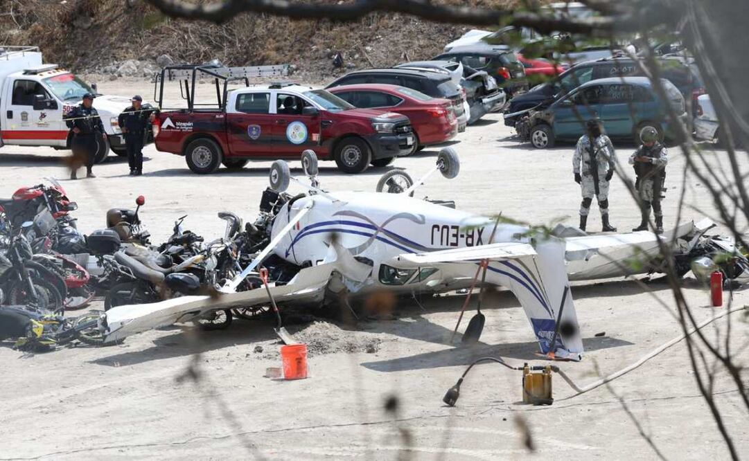Los hechos ocurrieron en un predio que sirve de depósito vehicular, que se encuentra en la carretera Atizapán Nicolás romero, a unos metros del aeropuerto de Atizapán y de la UAEM. Foto: Valente Rosas. EL UNIVERSAL
