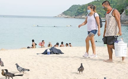 Huatulco entra a semáforo naranja; playas operan al 60% con horario restringido