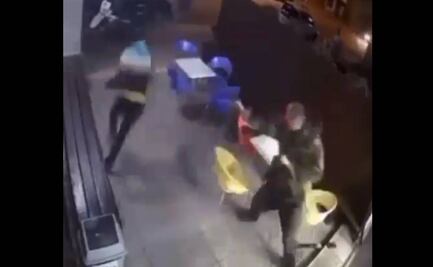 Policía de Uruguay frustra robo mientras come un helado con su hijo