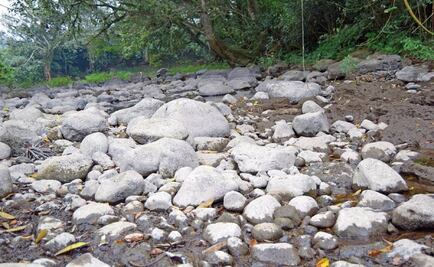 Prevén rellenar poza que generó socavón en río Atoyac