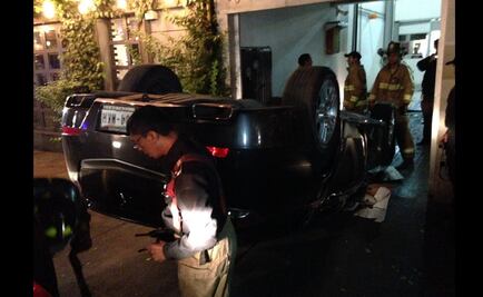 Cae auto cuando era estacionado en Polanco
