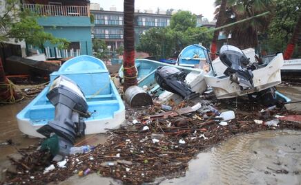 Huracán “Erick” daña y destruye embarcaciones de pescadores de Puerto Escondido, Oaxaca; reportan afectaciones menores en restaurantes, hoteles y negocios