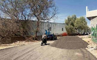 Reparan calles de la 4T en Tultitlán