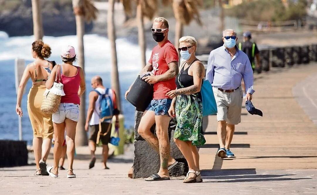 Personas portan cubrebocas como medida de seguridad contra el Covid-19. Foto: EFE / Ramón de la Rocha, archivo 