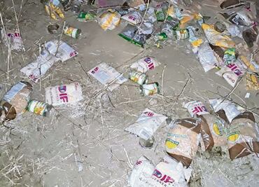 Hallan en fosa miles de despensas del DIFGuerrero