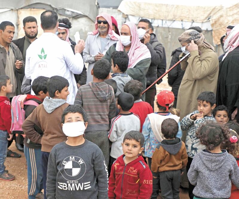 Integrantes de un campo de desplazados en Idlib, cerca de la frontera con Turquía. Foto: AAREF WATAD. AFP