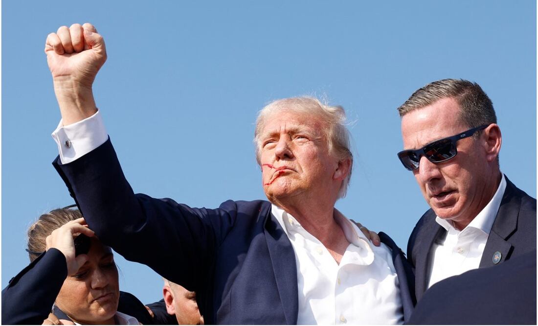 Donald Trump es protegido por el Servicio Secreto luego que intentaron atentar contra su vida. Foto: Anna Moneymaker/AP