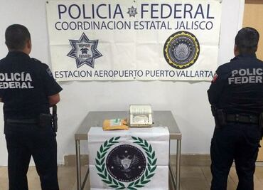 Aseguran cocaína oculta en libro de empresa de paquetería
