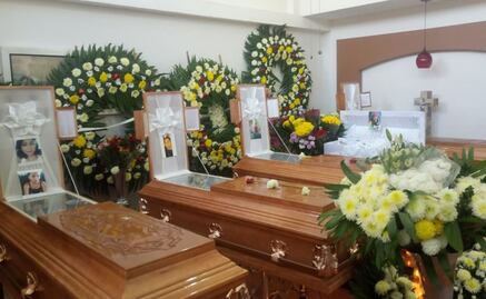 Denuncian que cuerpos de familia asesinada en Temixco tenían tiro de gracia