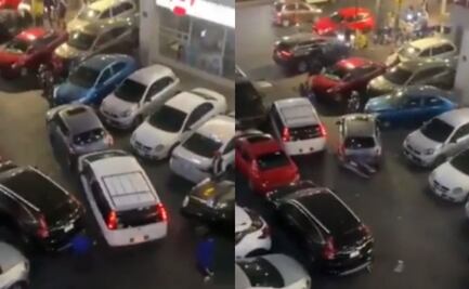 VIDEO: Buscan a conductor que arrolló a empleado y chocó con vehículos en estacionamiento de Coyoacán