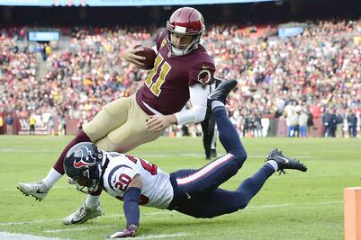 Alex Smith sufre fractura frente a los Texans