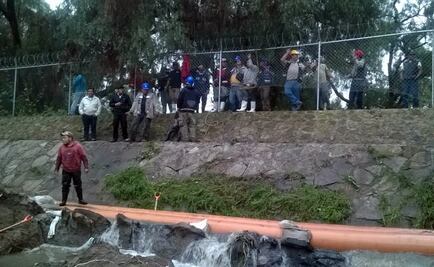 Lluvia desborda río en Atizapán