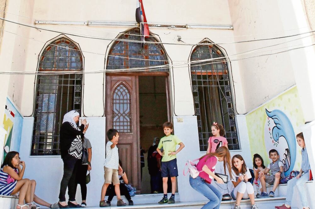 En Damasco, capital de Siria, aproximadamente 4 millones de niños iniciaron el ciclo escolar de manera normal. La ciudad es una de las que presenta menos afectaciones por el conflicto armado en el que se encuentra el país (YOUSSEF BADAWI. EFE)