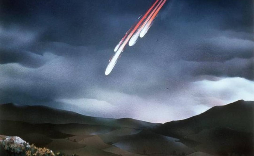 Impresión de un artista que muestra a un asteroide cayendo contra la Tierra. Foto: AP, archivo
