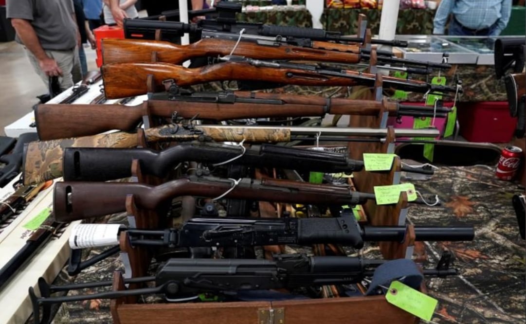 Rifles are displayed for sale - Photo:Joshua Roberts/REUTERS