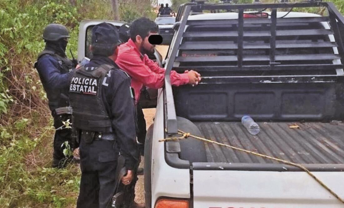 Ernesto “N”, alias Mingo , fue detenido a bordo de una camioneta y se le decomisaron un arma corta y una larga, cargadores, municiones y droga. / CORTESÍA