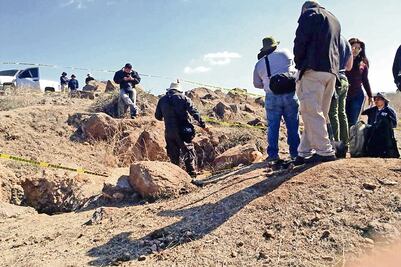 Hallan fosa con al menos 50 restos óseos
