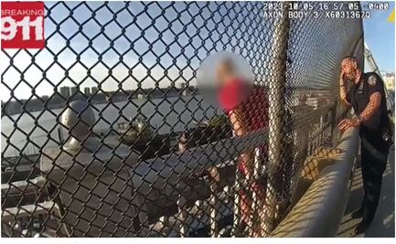 VIDEO “Escucha mi voz; te amo”: Entre lágrimas, policía impide que hombre salte de un puente en New York