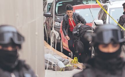 Matan a dos empresarios de grúas afuera de un hotel en Tlalne 