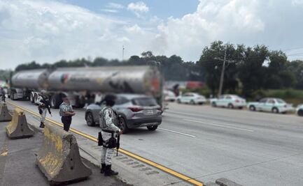 Después de 12 horas de bloqueo, manifestantes liberan autopista México-Querétaro; exigían aparición de taxistas