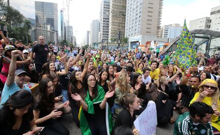 En medio de protestas, Lula asume como ministro de Rousseff