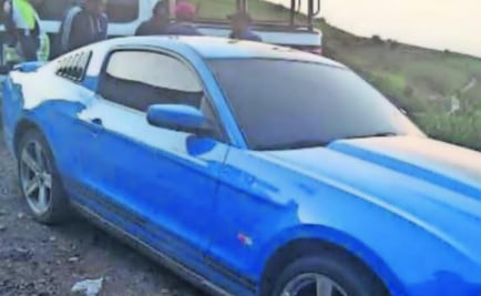 Hallan cadáver putrefacto dentro de Mustang abandonado en Edomex