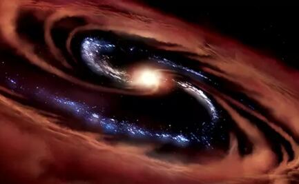 Una galaxia desafía y resiste a ser devorada por un agujero negro