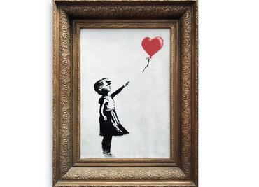Obra de Banksy se autodestruye en una subasta
