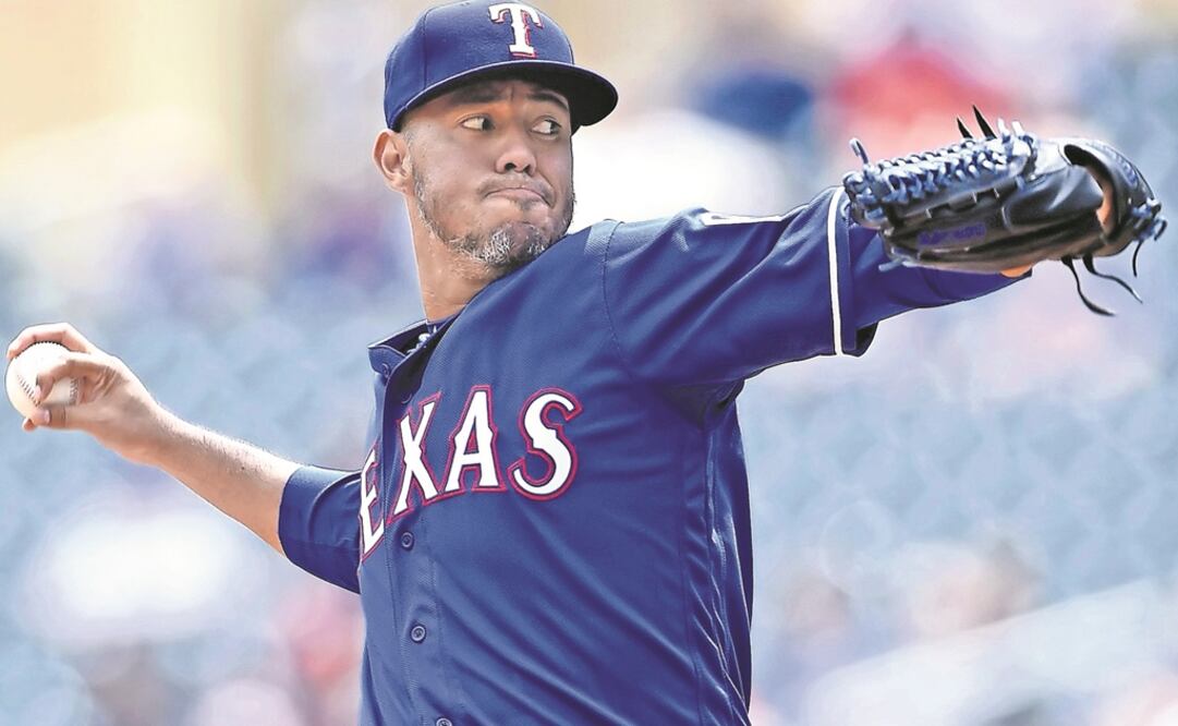 El pitcher derecho está en su segunda etapa con los Rangers de Texas. (HANNA FOSTIEN. AFP)