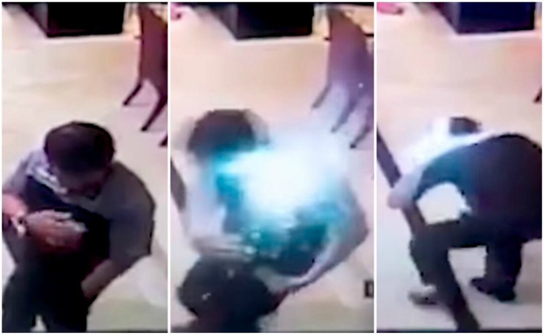 En el video se aprecia cómo el hombre desesperadamente trata de quitarse la camisa sin éxito