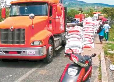 Saquean bodegas por falta de fertilizante