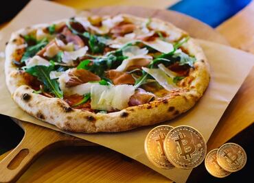 Ofrecen pizza gratis para impulsar uso de criptomonedas