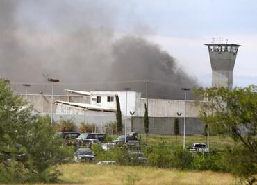 Suman 18 reos muertos por motín en penal de Cadereyta