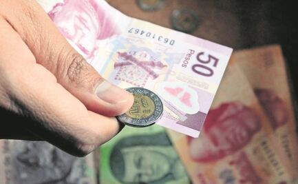 Según FMI, baja poco a poco uso global de efectivo