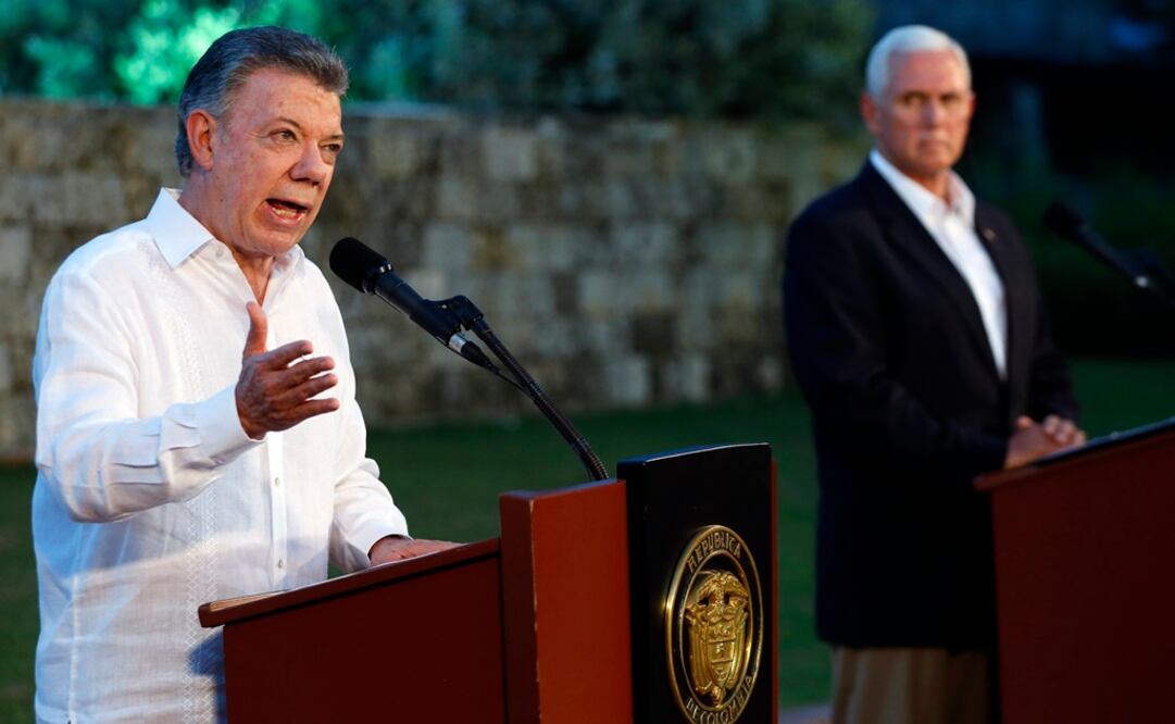El presidente de Colombia, Juan Manuel Santos, y el vicepresidente de Estados Unidos, Mike Pence (Foto: AP)