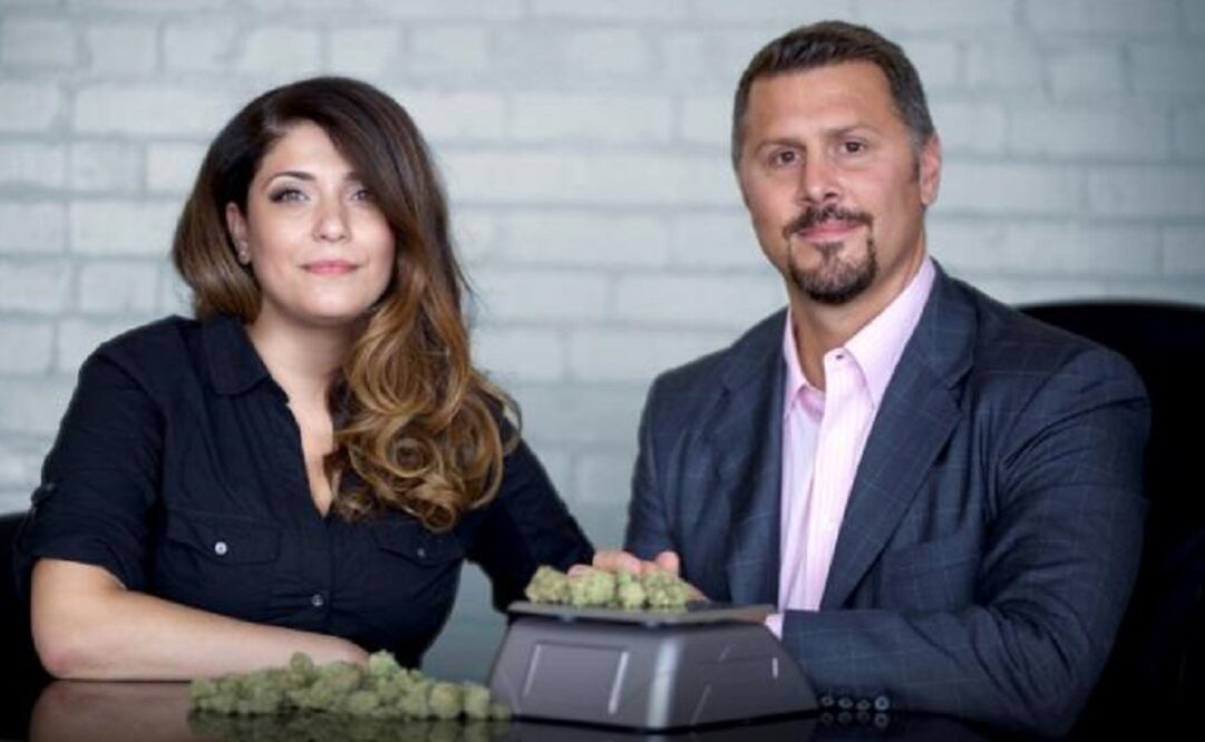 Terra Tech's CEO Derek Peterson and Salwa Ibrahim pose with marijuana at the Blum medical cannabis dispensary in Oakland, California. (Photo: Reuters)