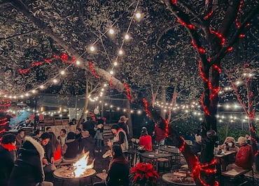 Navidad, pizza y fogata en un restaurante al aire libre en el Ajusco