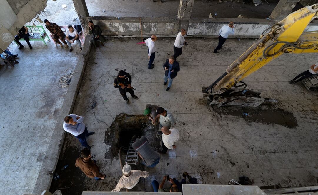 Las bolsas fueron recuperados de las arcas subterráneas de una sucursal del banco central en la ciudad de Mosul, en el norte de Irak. Foto: AFP