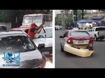 Taxista enloquece y rompe con tubo parabrisas de auto